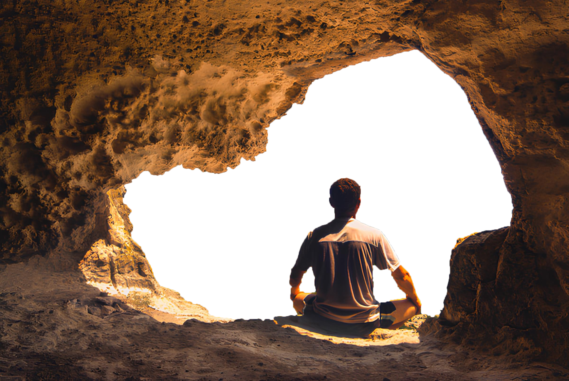 Man-sitting-in-cave-mouth-meditation-Stock-Photo (1)